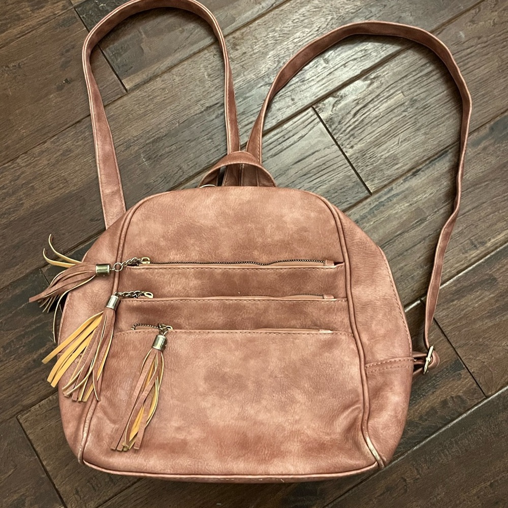Distressed backpack purse